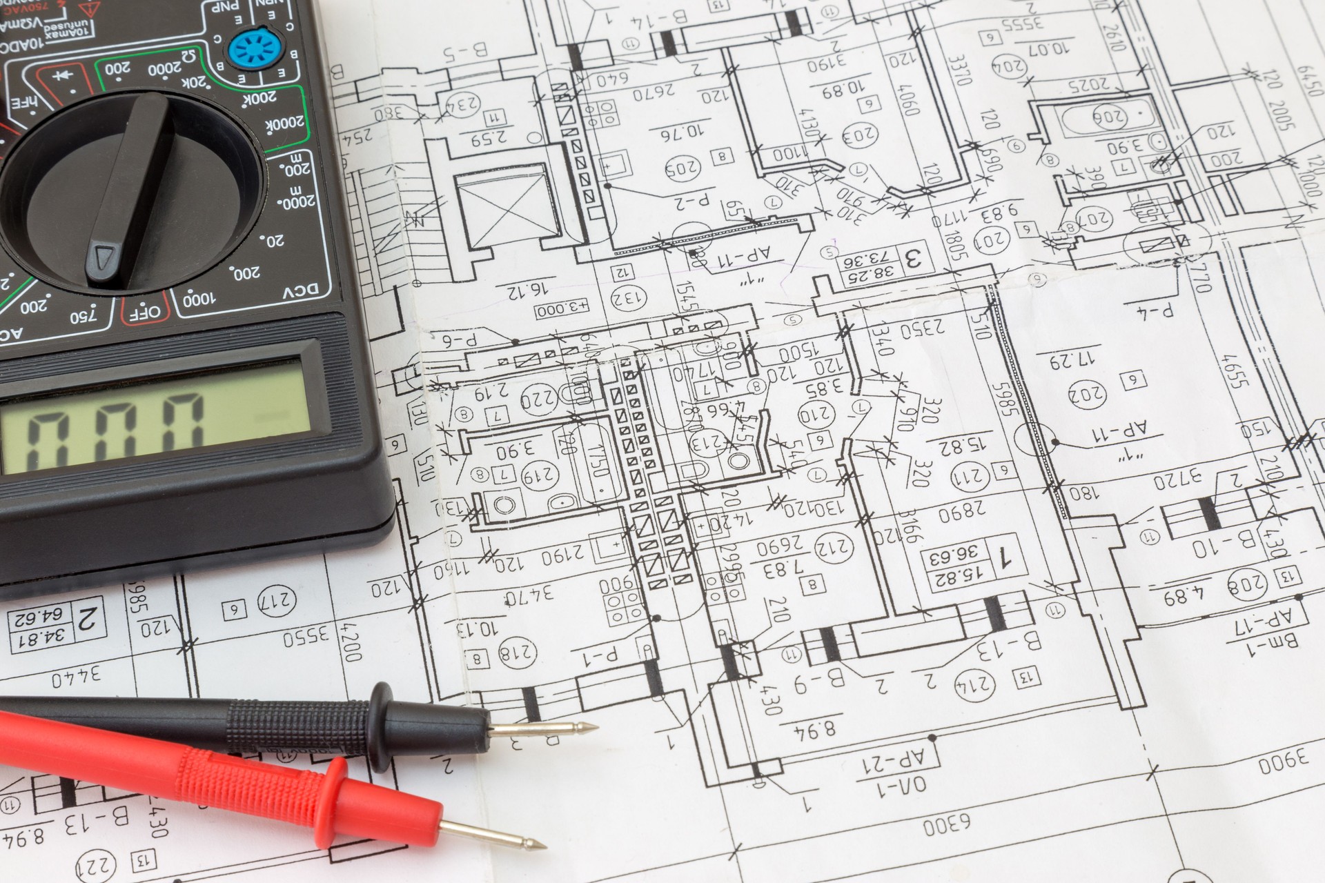 Still Life Of Electrical Components Arranged On Plans